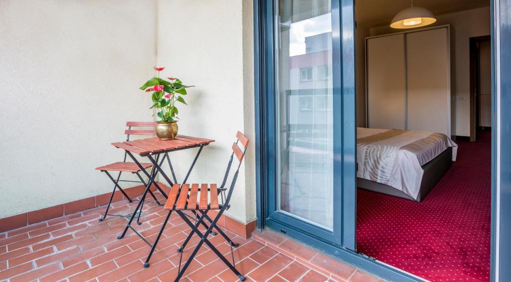 Postel nebo postele na pokoji v ubytování Orhideea Residence & Spa