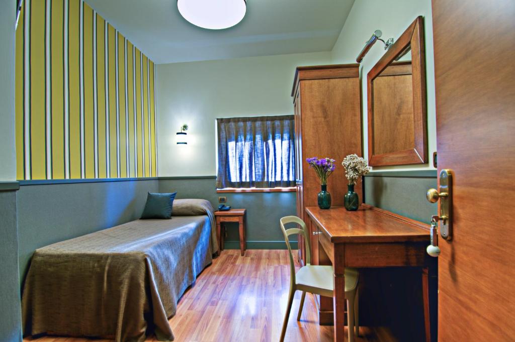 Łóżko lub łóżka w pokoju w obiekcie Hotel Golf