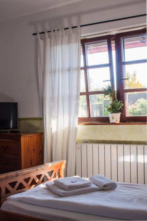 Postel nebo postele na pokoji v ubytování Terra