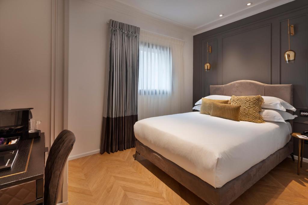 Postel nebo postele na pokoji v ubytování Hotel Jacob Samuel by Prima Hotels