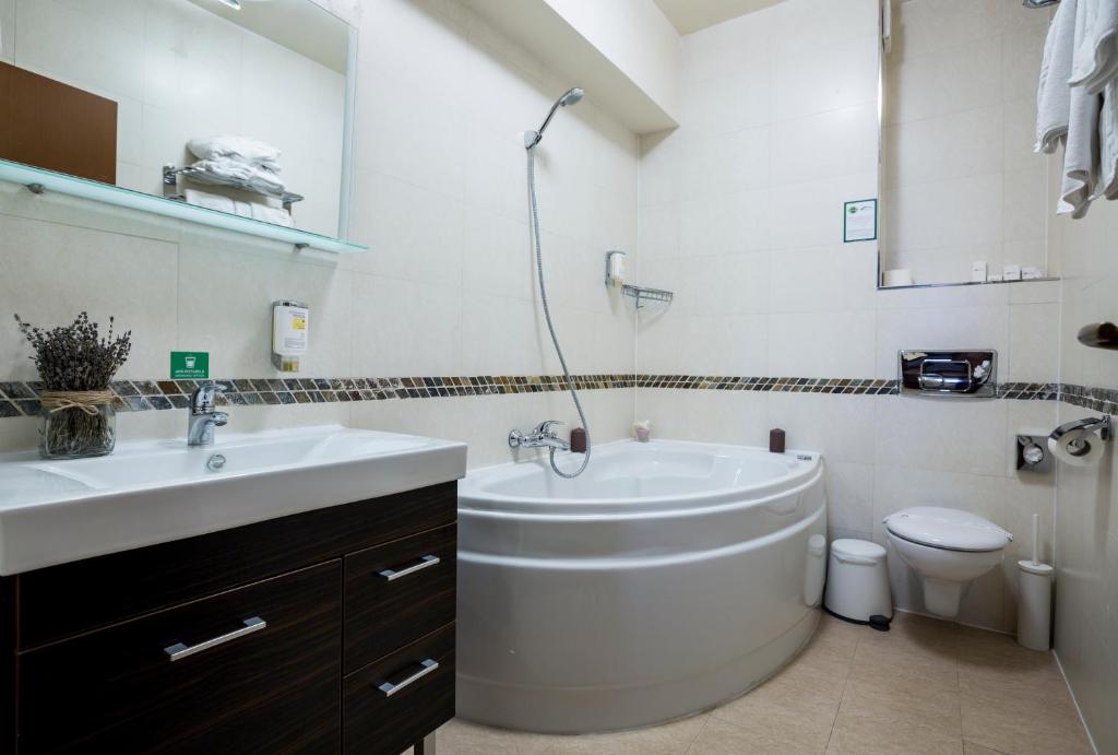 Koupelna v ubytování Orhideea Residence & Spa
