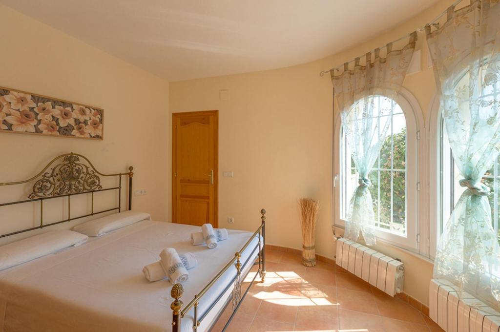 Postel nebo postele na pokoji v ubytování Villas Guzman - Estefania
