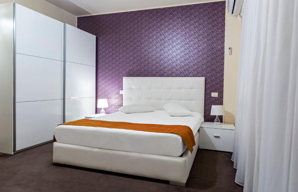 Postel nebo postele na pokoji v ubytování Orhideea Residence & Spa