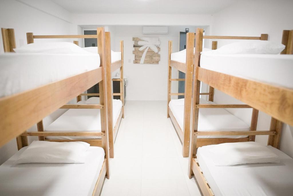 Postel nebo postele na pokoji v ubytování Downtown Hostel Chetumal