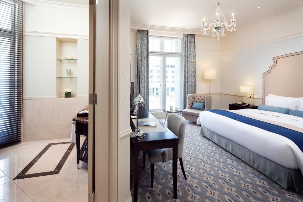 a hotel room with a bed and a desk at The Tokyo Station Hotel in Tokyo
