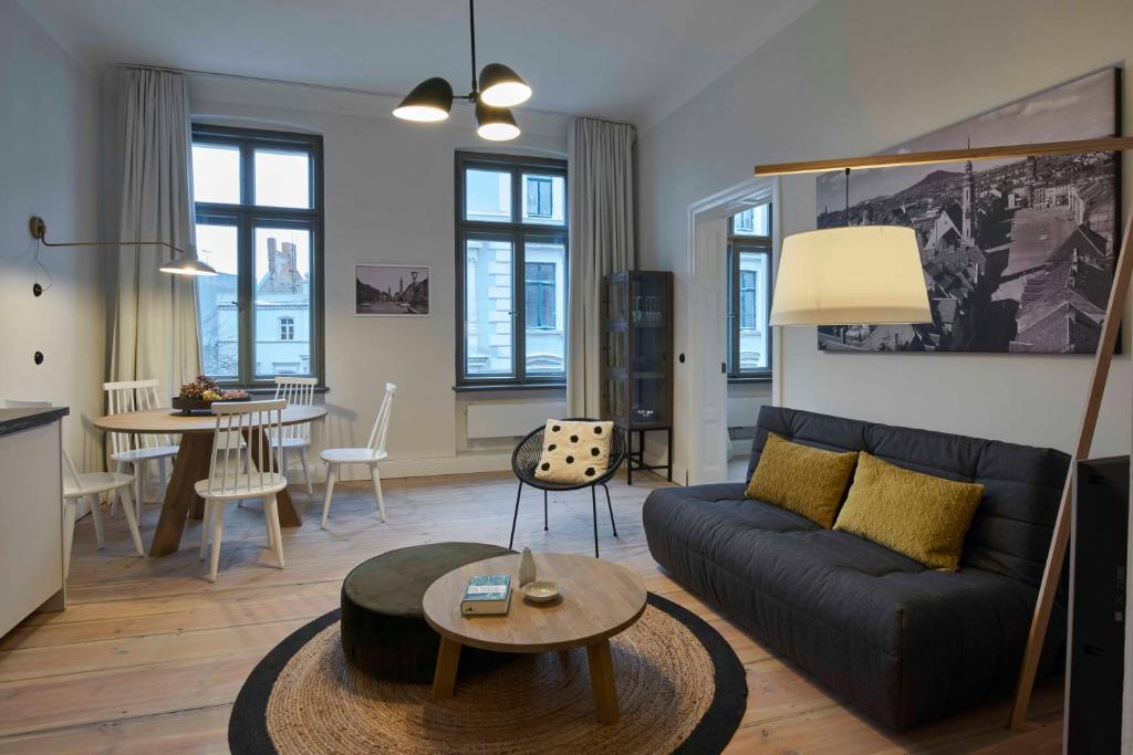 Posezení v ubytování VIA`s Appartements und Ferienwohnungen