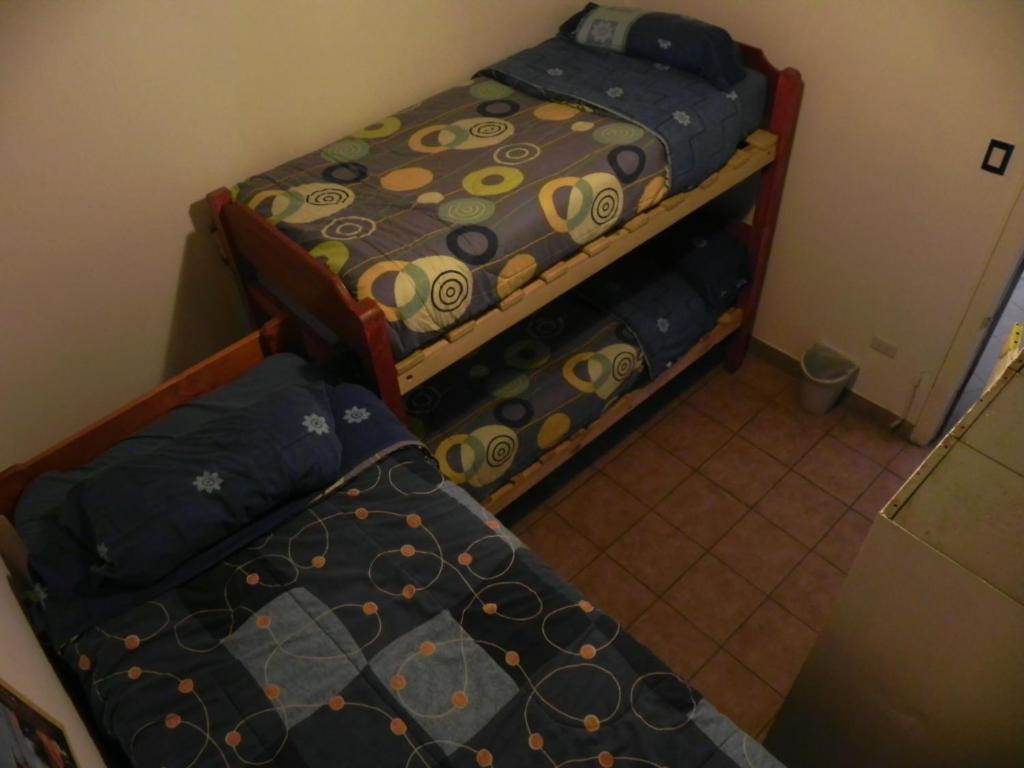 Postel nebo postele na pokoji v ubytování Lemuria Hostel