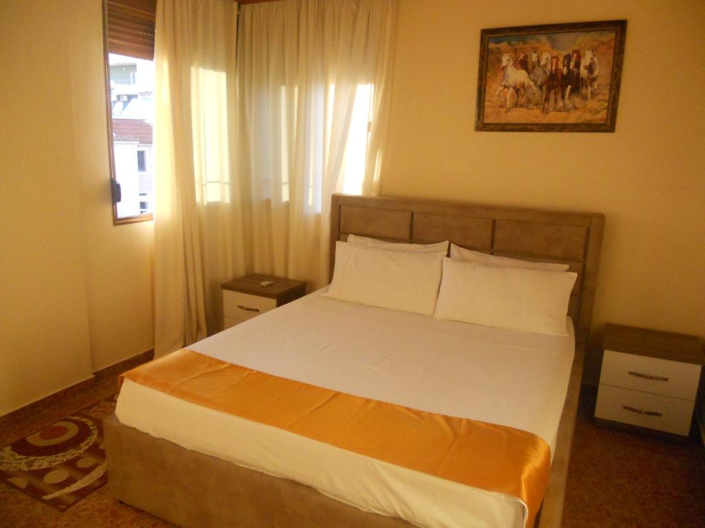 Postel nebo postele na pokoji v ubytování Onorato Hotel