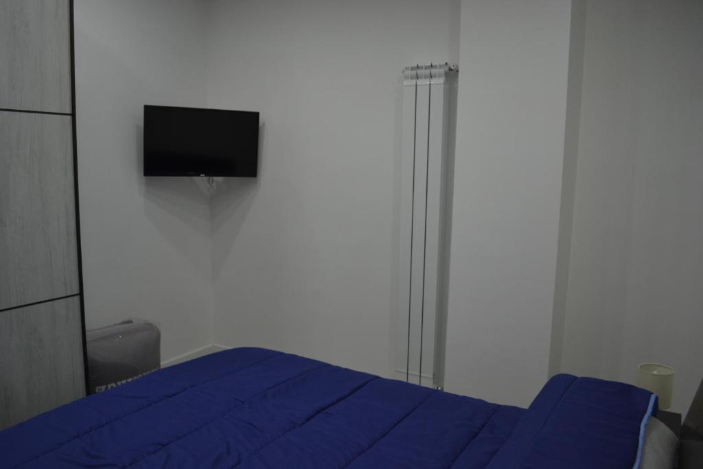 Telewizja i/lub zestaw kina domowego w obiekcie Marina Guest Home