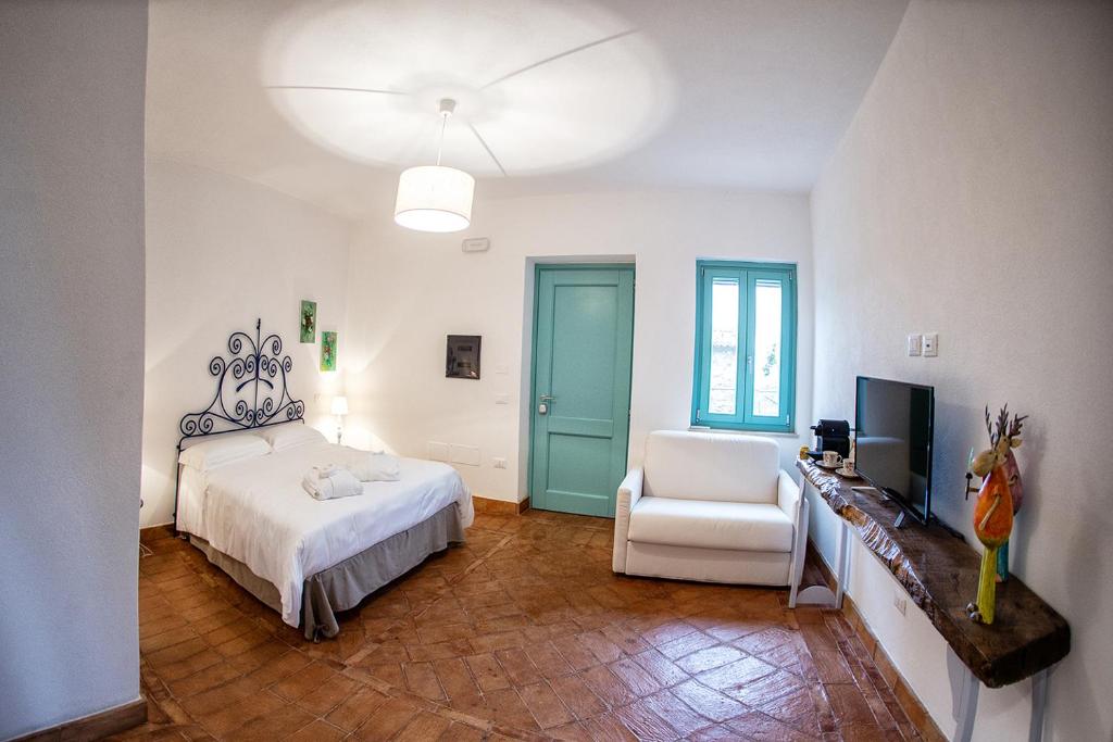 Posteľ alebo postele v izbe v ubytovaní Borgo Rosso di Sera - Resort Country Chic