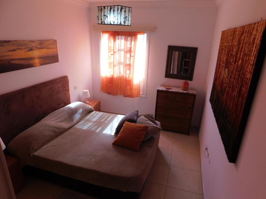 Postel nebo postele na pokoji v ubytování Sol de Tenerife