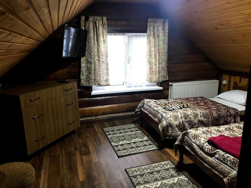Postel nebo postele na pokoji v ubytování Fayniy Motel