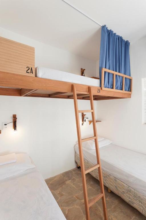 Palanda nebo palandy na pokoji v ubytování BRECHA HOSTEL & ROOFTOP - Maragogi