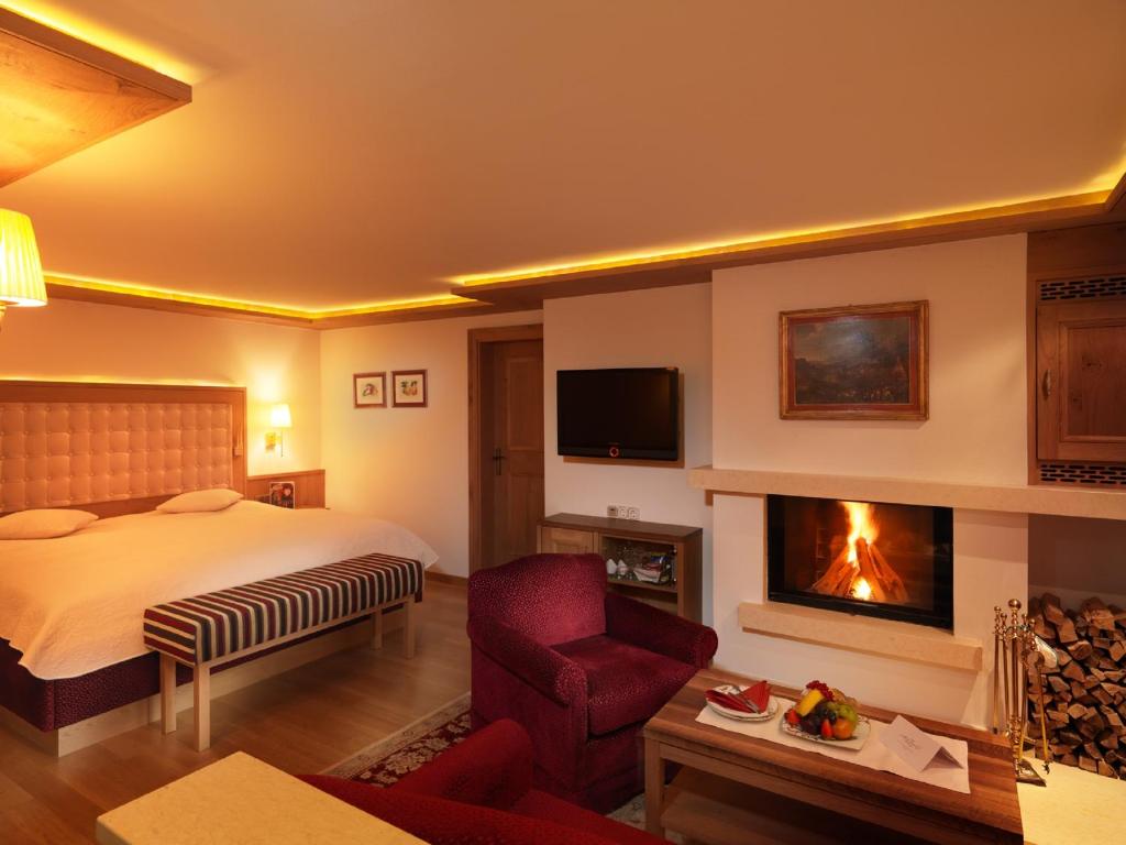 Postel nebo postele na pokoji v ubytování Hotel Zürserhof