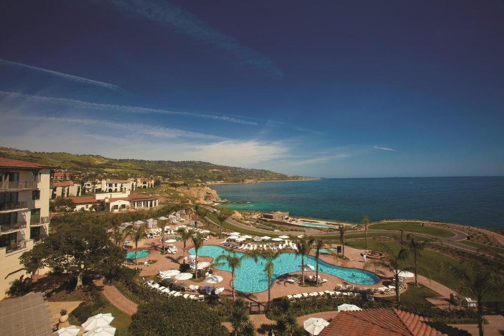 
a large body of water with houses and boats at Terranea - L.A.'s Oceanfront Resort in Rancho Palos Verdes
