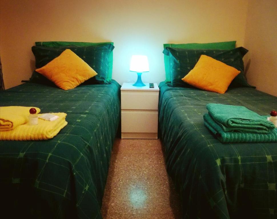 A bed or beds in a room at B&B Stelle Di Roma
