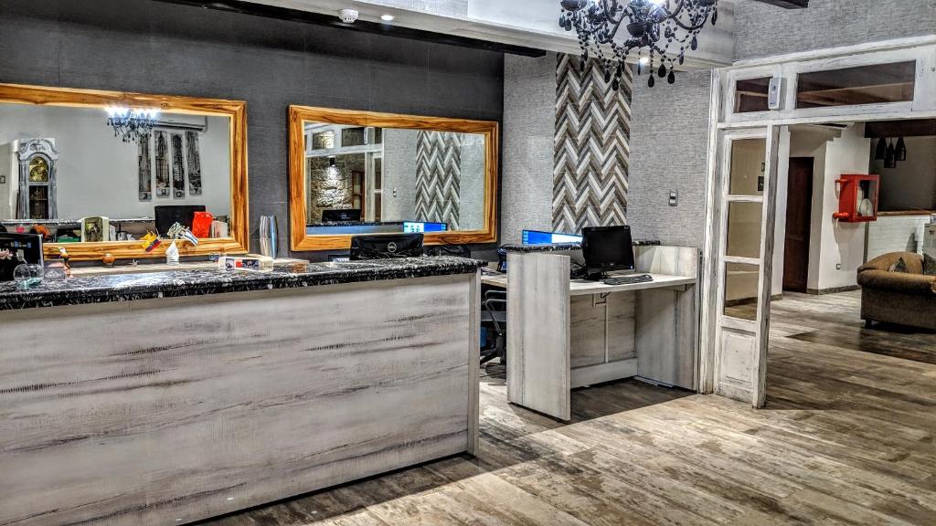 Kuchyň nebo kuchyňský kout v ubytování Cedros Inn Boutique Hotel