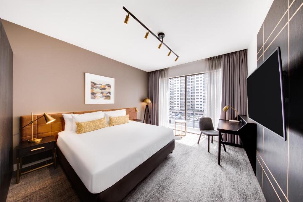 Postel nebo postele na pokoji v ubytování Vibe Hotel Sydney