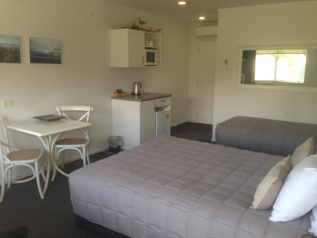 Kuchyň nebo kuchyňský kout v ubytování Motel Oasis