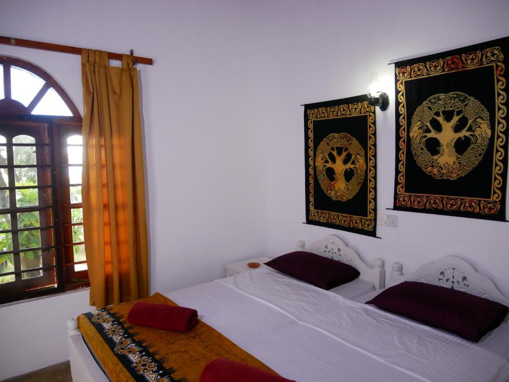 Postel nebo postele na pokoji v ubytování Sunchaser Beach Hotel