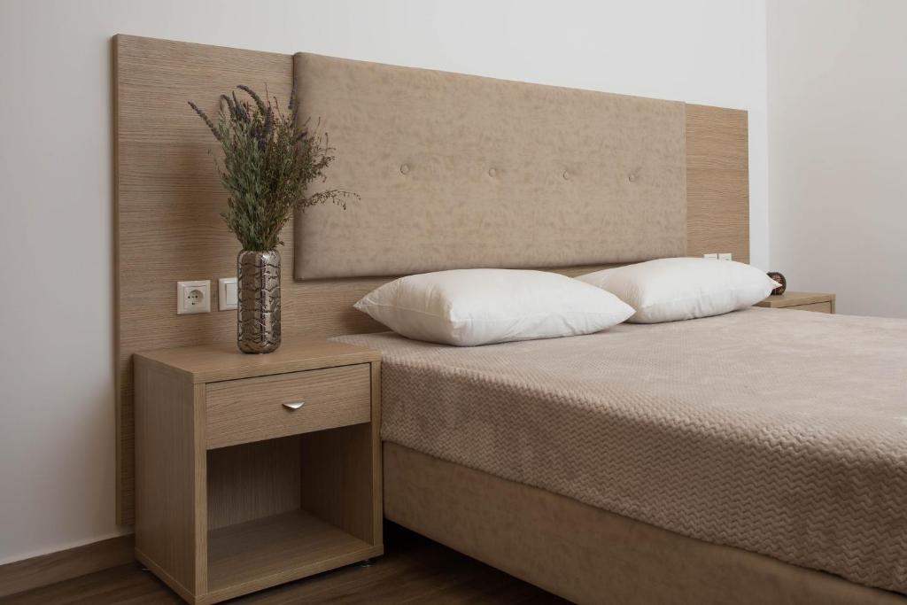 Postel nebo postele na pokoji v ubytování Mare Naxia Hotel