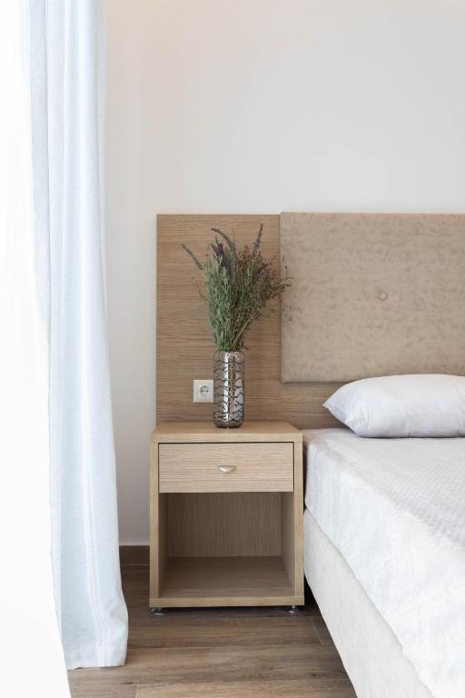 Postel nebo postele na pokoji v ubytování Mare Naxia Hotel