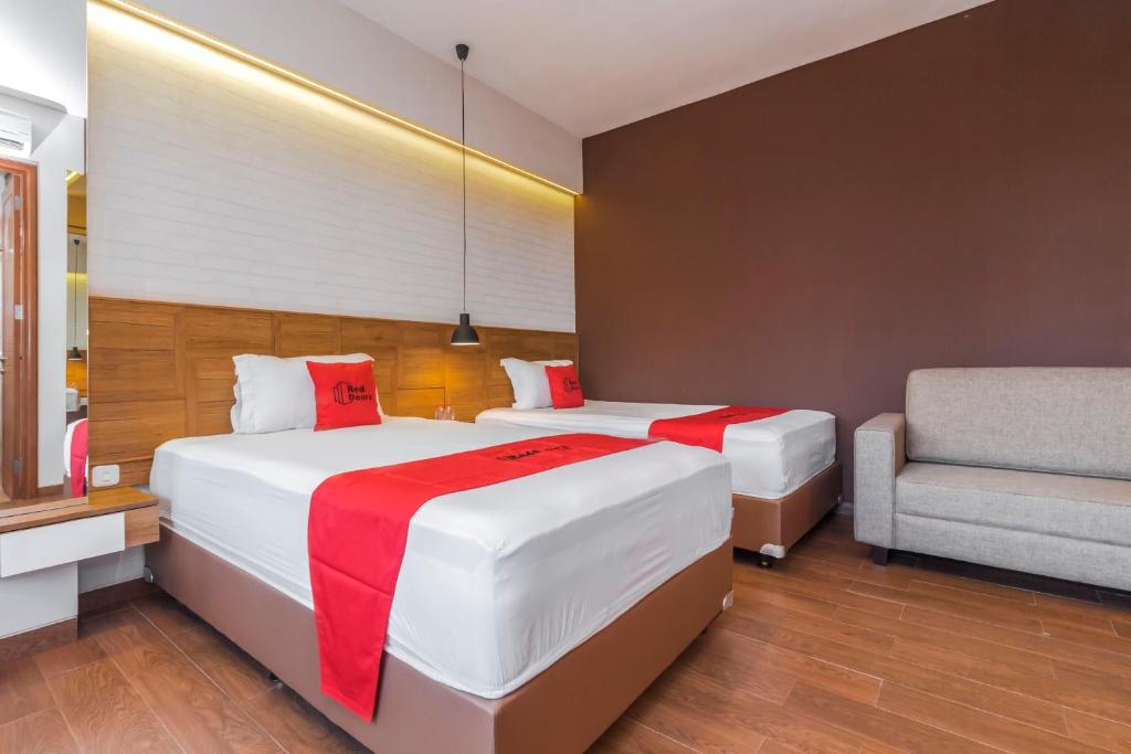 Letto o letti in una camera di RedDoorz Plus @ CBD Bintaro