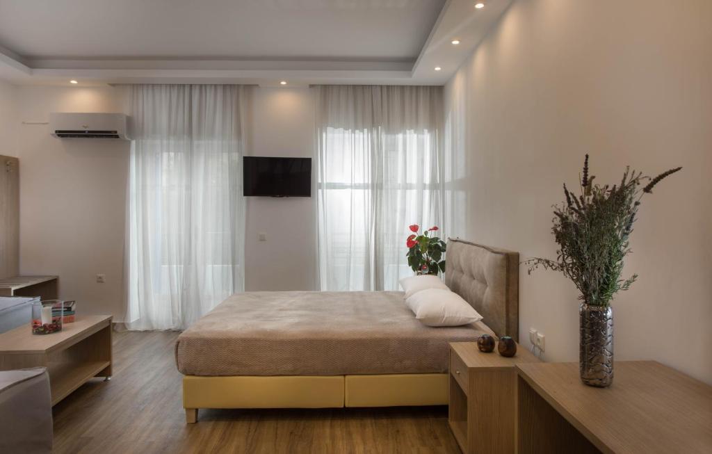 Postel nebo postele na pokoji v ubytování Mare Naxia Hotel