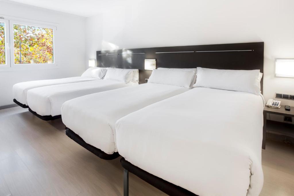 Postel nebo postele na pokoji v ubytování B&B HOTEL Barcelona Rubí