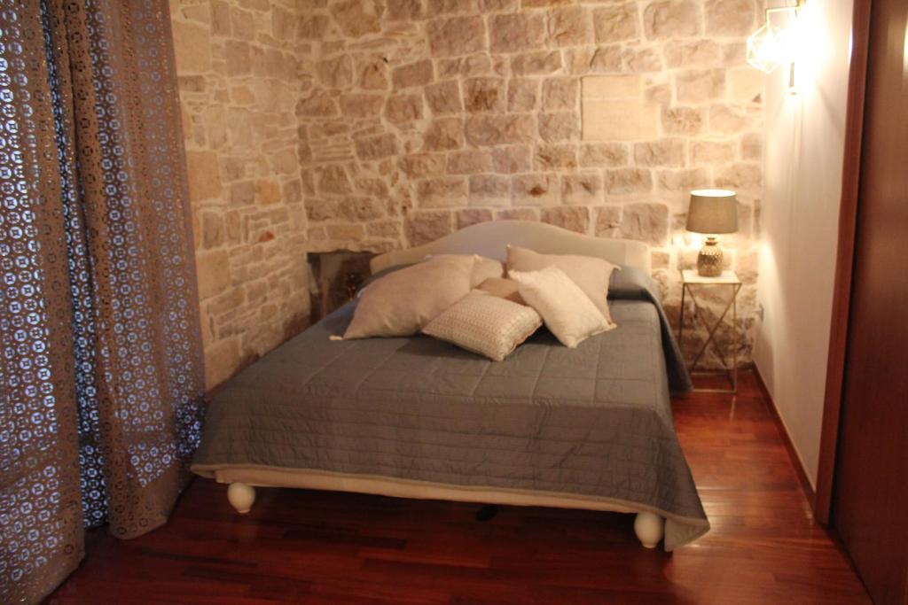 Postel nebo postele na pokoji v ubytování B&B La Dimora