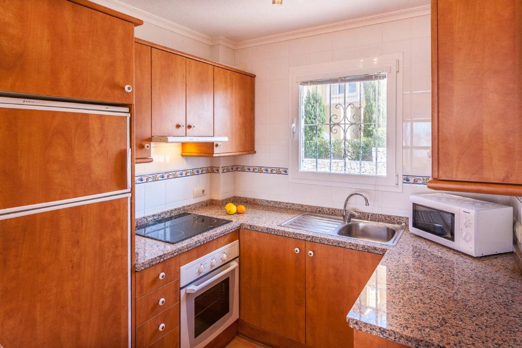 Kuchyňa alebo kuchynka v ubytovaní Villas Guzman - Apartamento Murillo