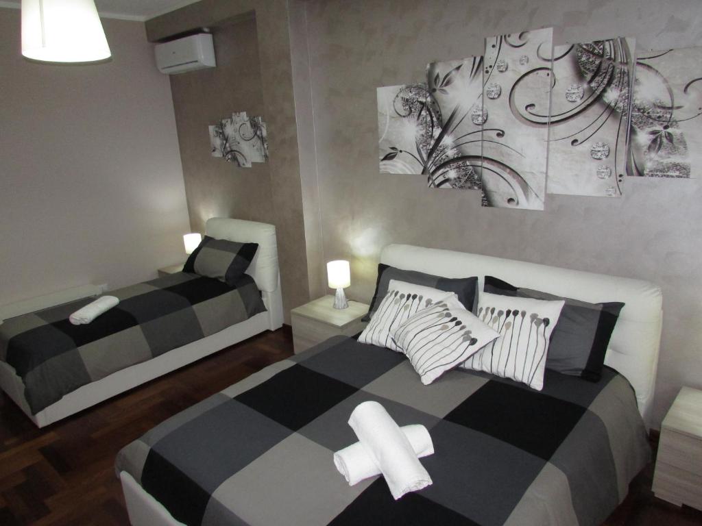 Posteľ alebo postele v izbe v ubytovaní Agrigento Dream Apartment