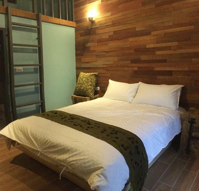 Postel nebo postele na pokoji v ubytování Luck Homestay