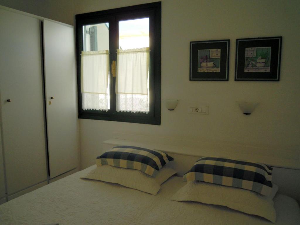 Postel nebo postele na pokoji v ubytování Palemilos Apartments