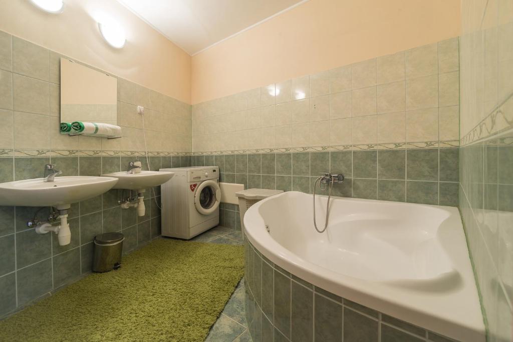 Kúpeľňa v ubytovaní Aqua Line Apartmanház