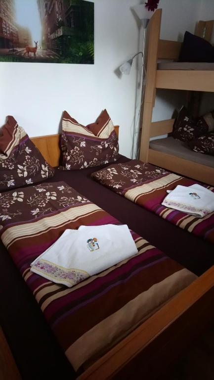 Postel nebo postele na pokoji v ubytování Haus Wastl