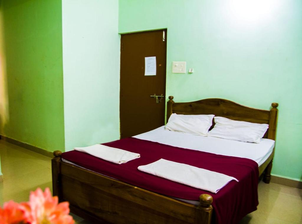 Postel nebo postele na pokoji v ubytování Dio's Guest House