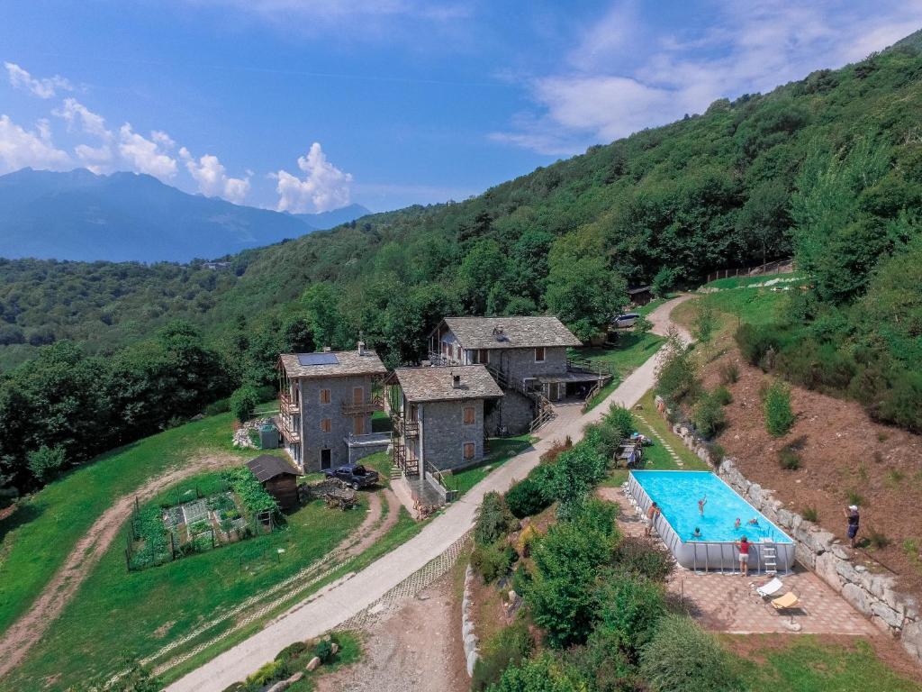 an aerial view of a house in a mountain at Agriturismo La Pedruscia in Civo