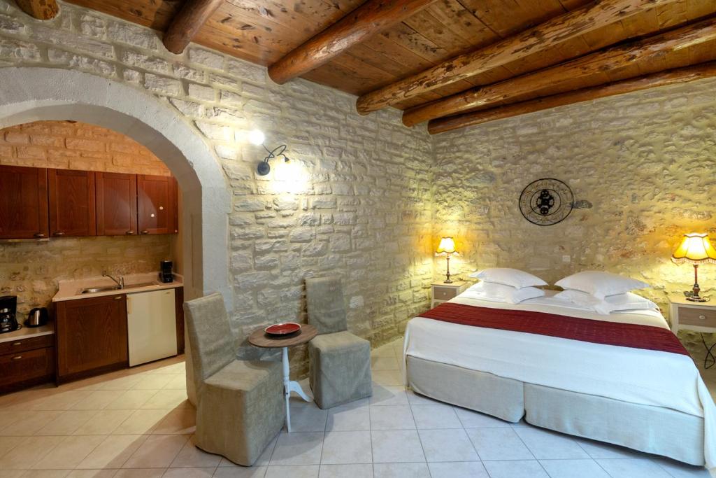 Postel nebo postele na pokoji v ubytování Casa Moazzo Suites and Apartments