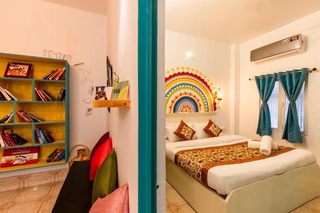 Postel nebo postele na pokoji v ubytování Wander Station Varanasi