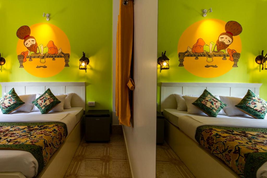 Postel nebo postele na pokoji v ubytování Wander Station Varanasi