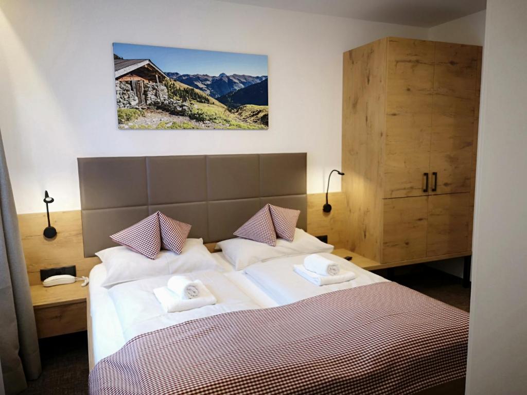 Posteľ alebo postele v izbe v ubytovaní Hotel Aschauer Hof z'Fritzn