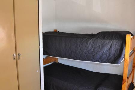 Una cama o camas en una habitación de Departamento en San Bernardo, partido de la costa
