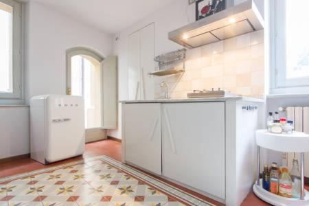 A kitchen or kitchenette at Papavero Accademia Carrara