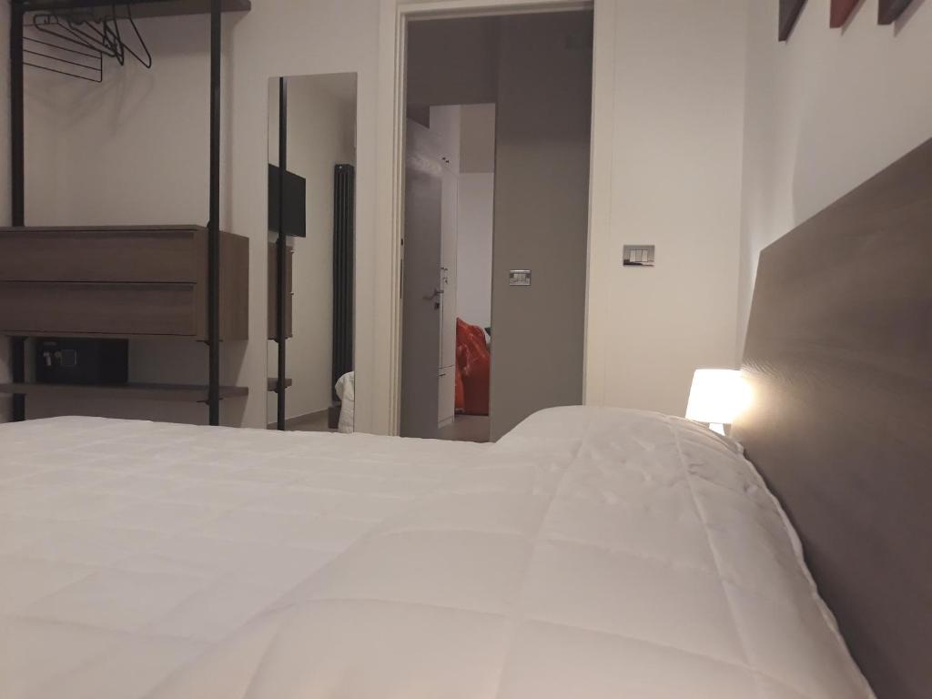 Postel nebo postele na pokoji v ubytování Cuoreverde Matera