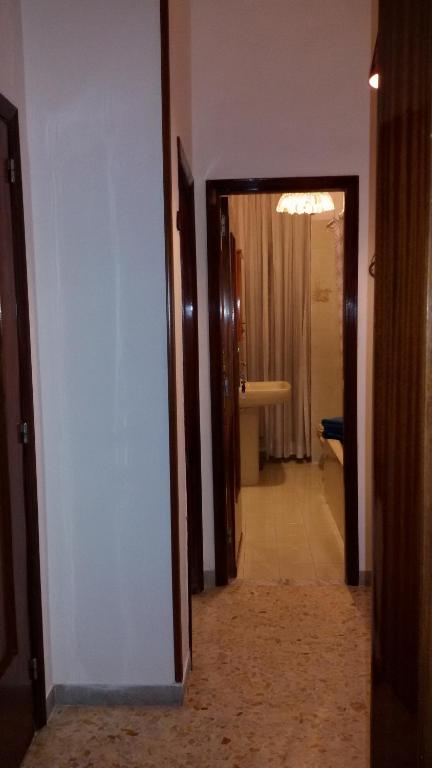 Łóżko lub łóżka w pokoju w obiekcie B&B Metropolitan Taranto