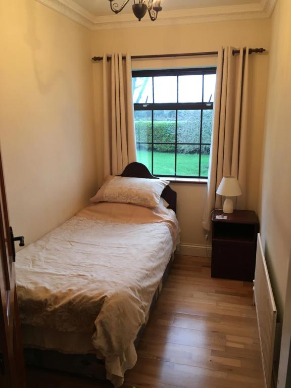 Letto o letti in una camera di Oakdale, Templemore, E41F856