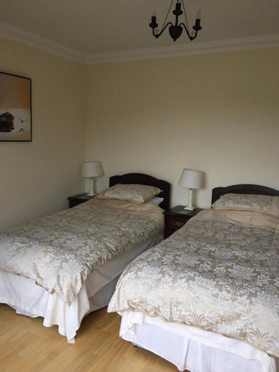Letto o letti in una camera di Oakdale, Templemore, E41F856