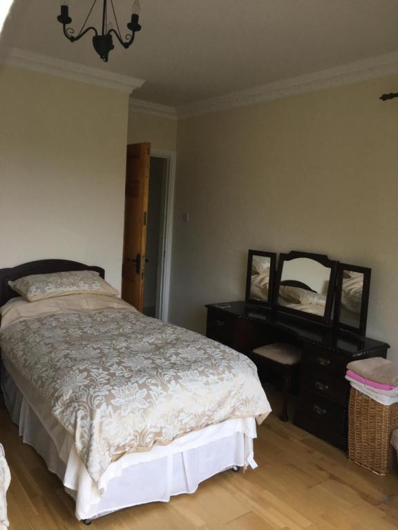 Letto o letti in una camera di Oakdale, Templemore, E41F856