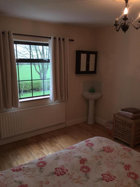Letto o letti in una camera di Oakdale, Templemore, E41F856